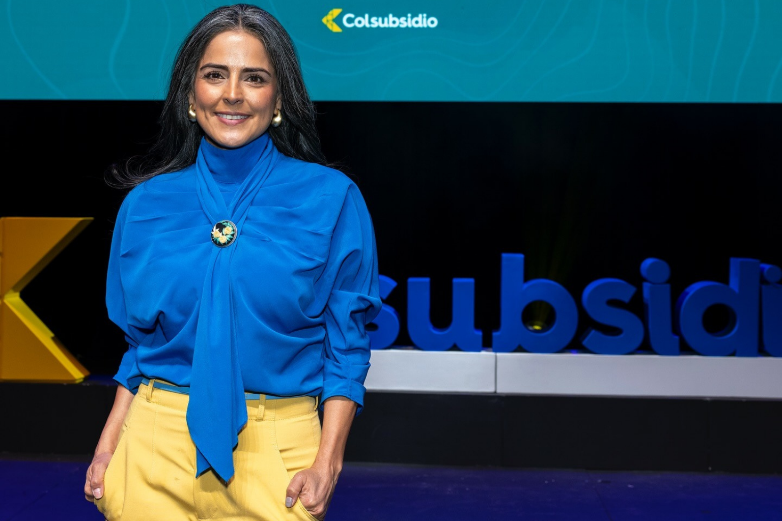 Claudia Palacios en evento de Colsubsidio hablando de liderazgo femenino y equidad.