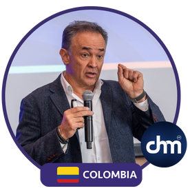 Mauricio Duarte en imagen de perfil circular con bandera de Colombia y logo de Charlas Motivacionales Latinoamérica.